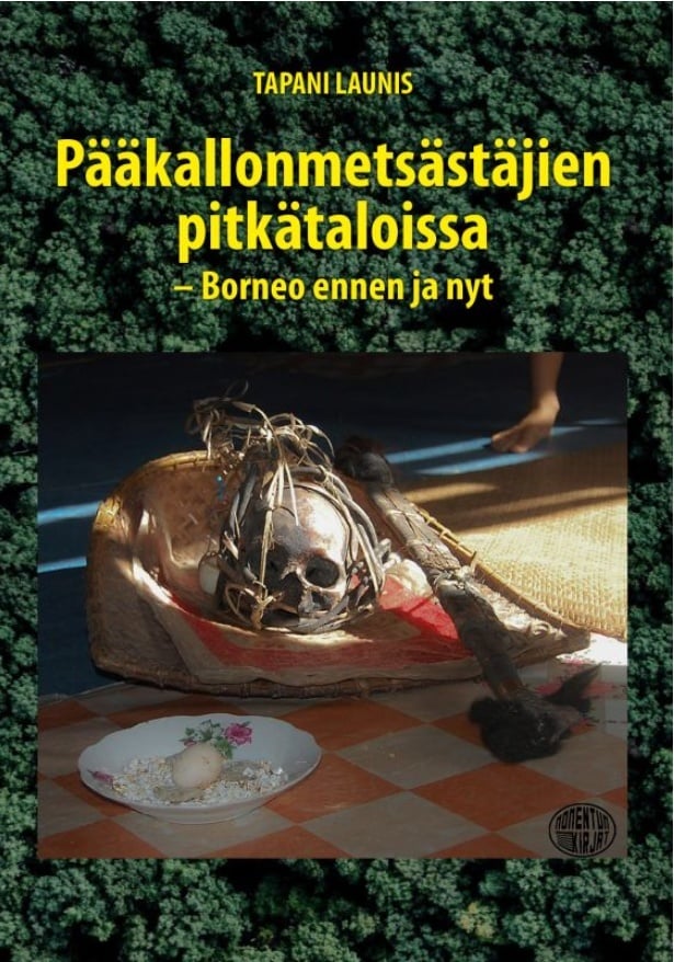Pääkallonmetsästäjien pitkätaloissa : Borneo ennen ja nyt